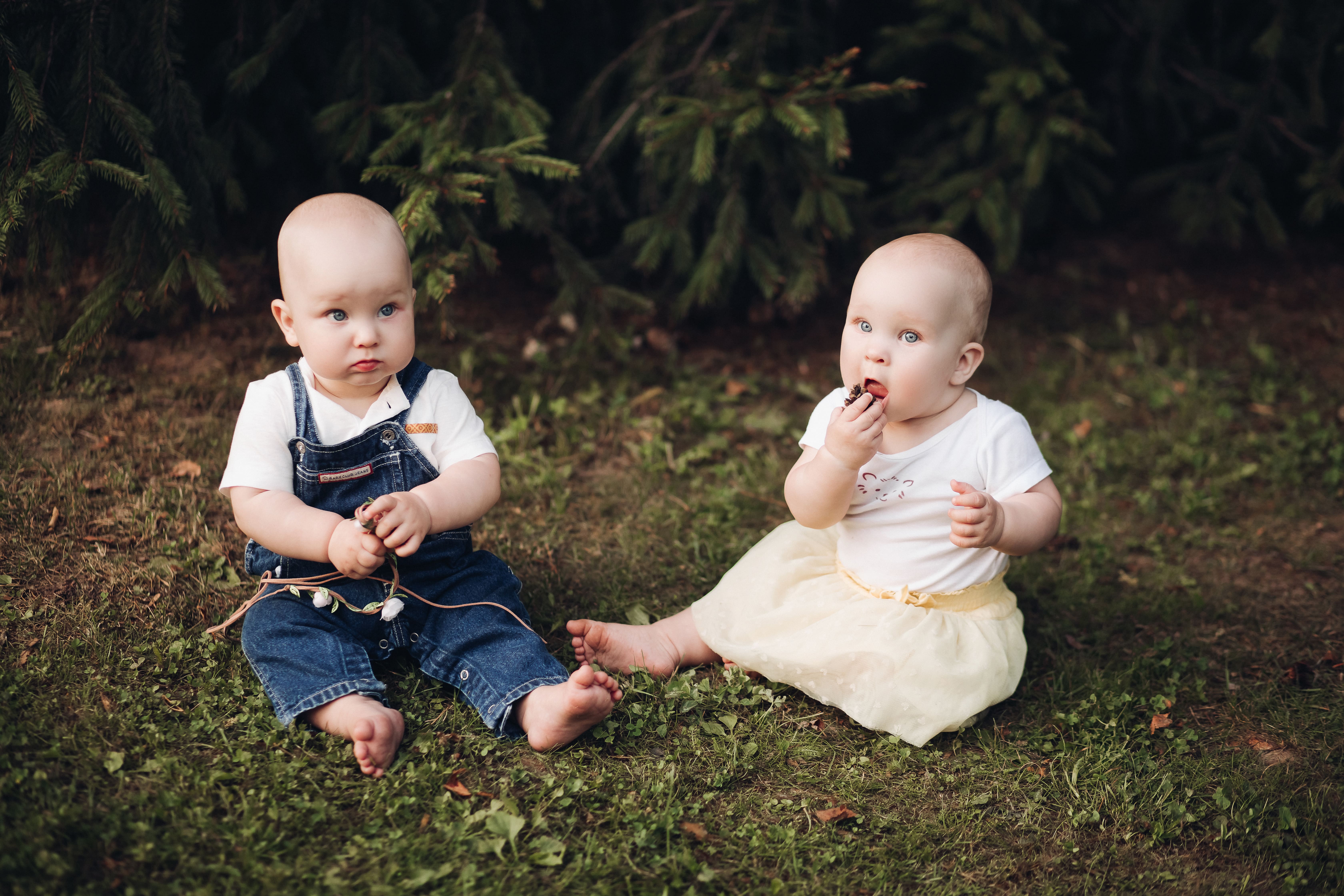 stock-photo-adorable-little-babies-sitting-grass-forest-little-brother-sister-eating-berries-while-sitting-green-grass-forest (1).jpg